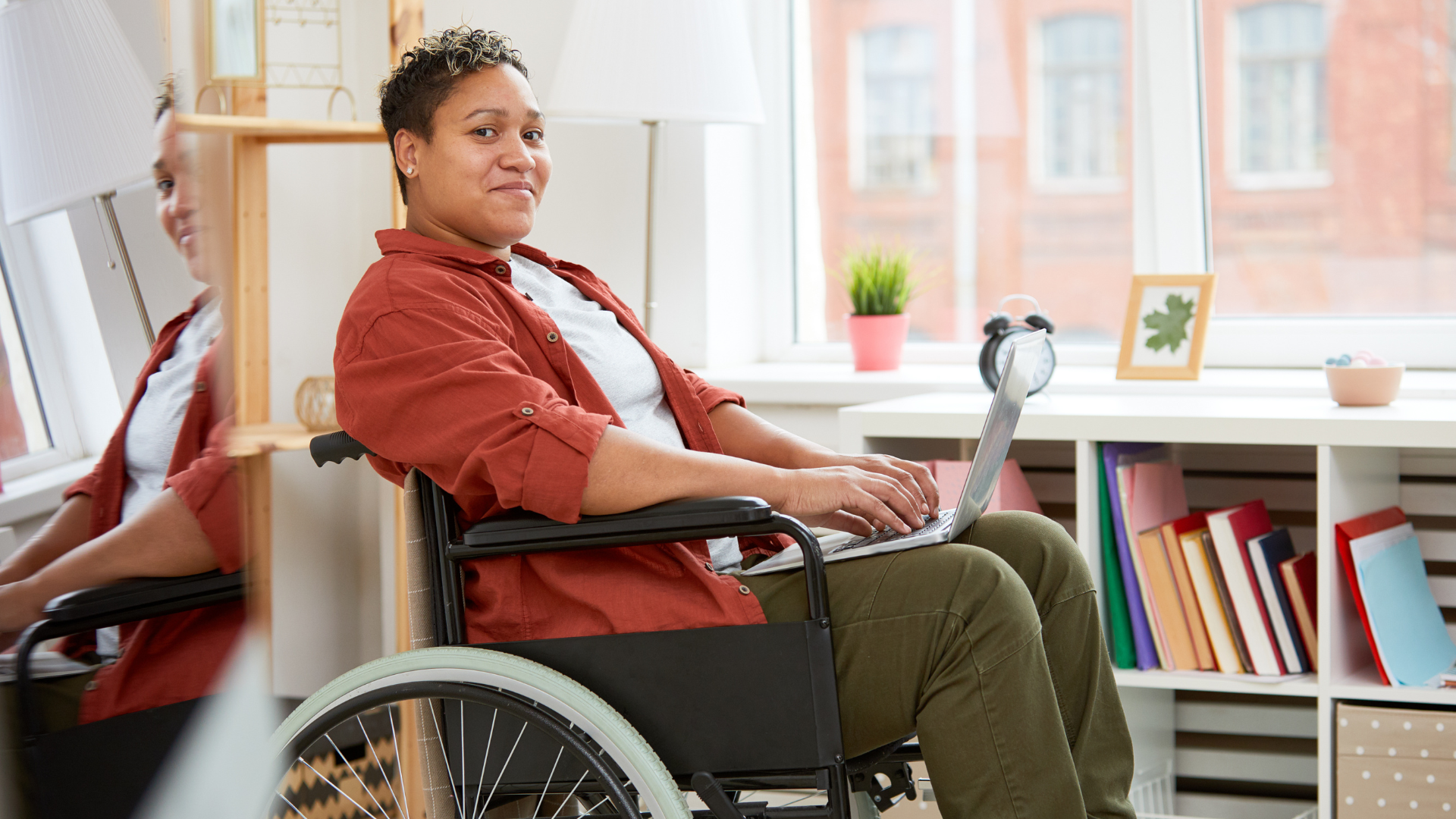 Woman in a wheelchair on her laptop