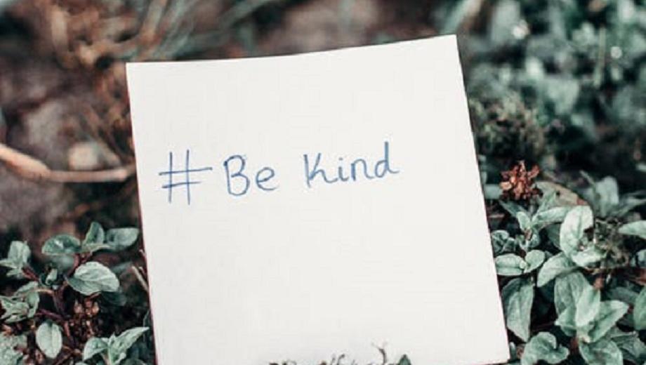 piece of paper with #bekind written on it